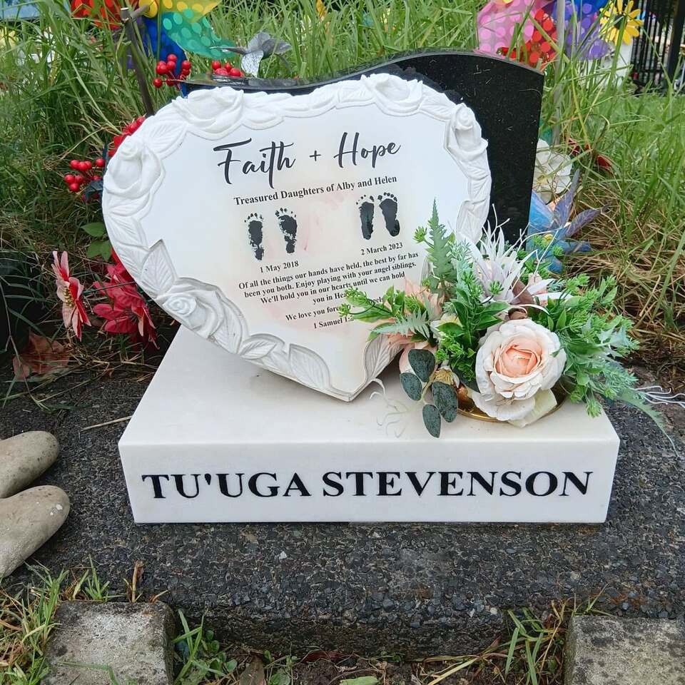 White gravestone after maintenance