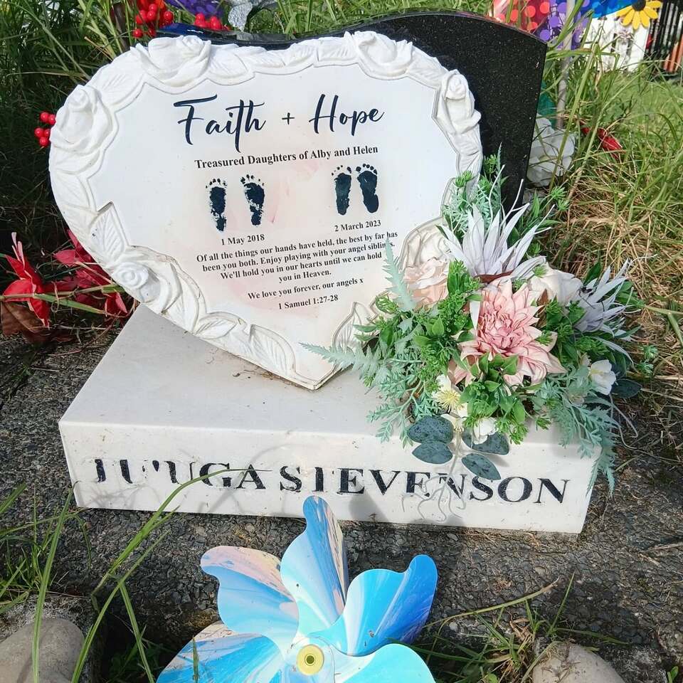 White gravestone before maintenance